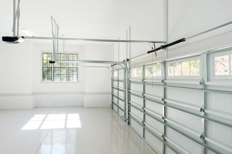 Guide complet pour la pose de porte de garage &agrave; Belleu